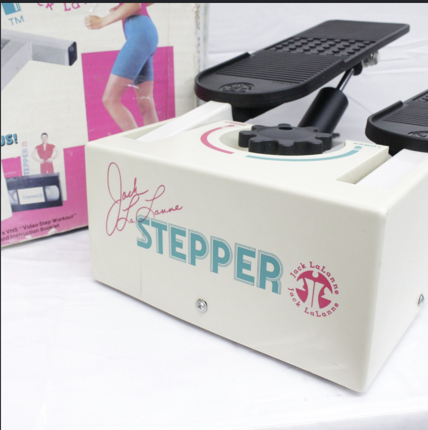 Jack LaLanne Mini Stepper with its white branded base, black pedals and retail packaging